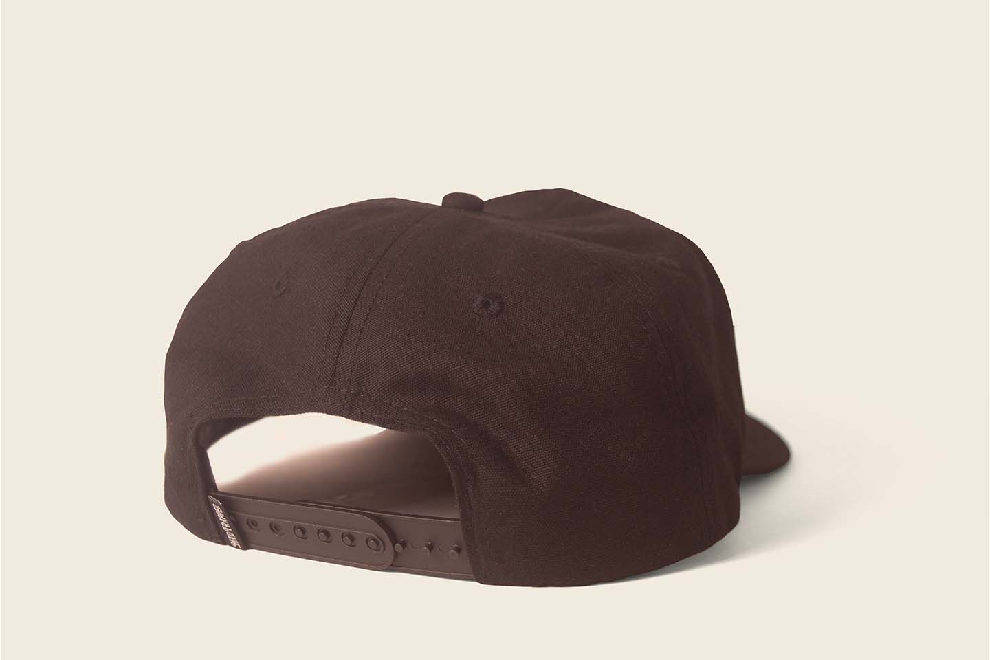 Crockett Hat from Mad Trapper in black cotton canvas with black snapback enclosure.