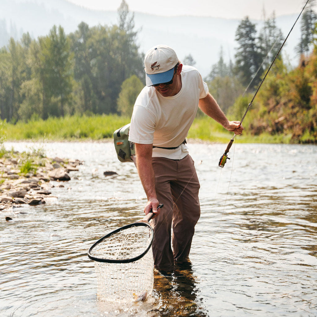 Fly Fisherman wearing the Angler Hat 