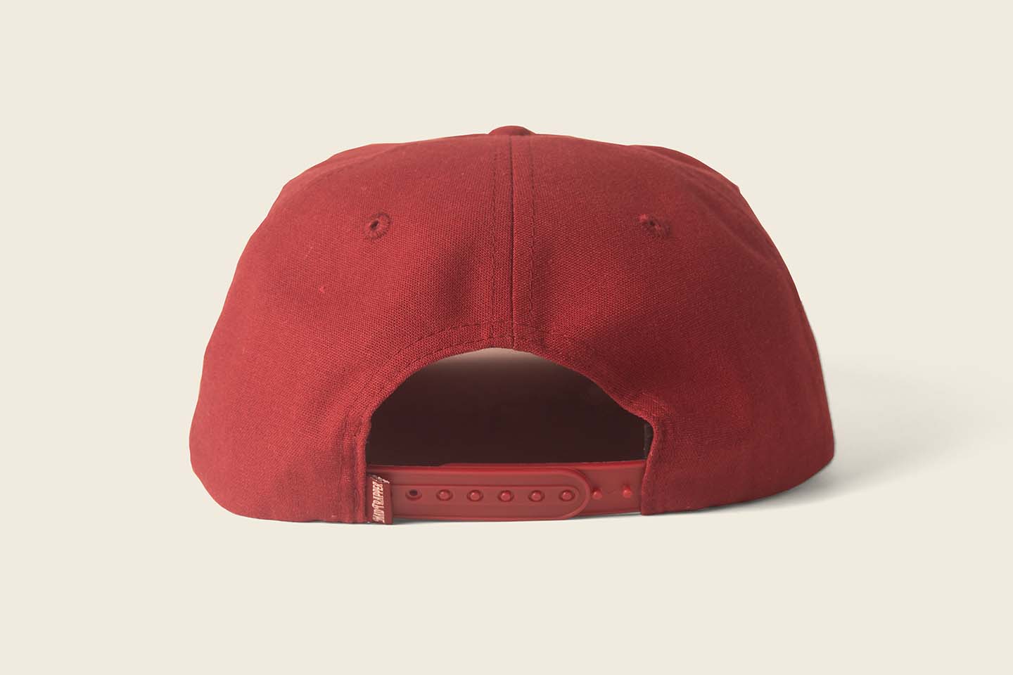 Mad Trapper Crockett Hat from back view. Maroon color. 