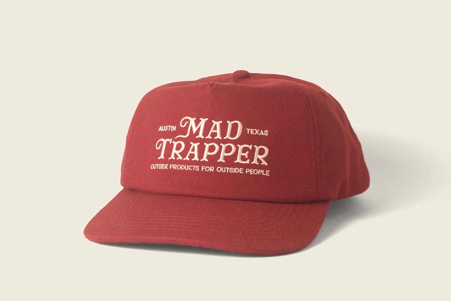 Mad Trapper Hudson Hat in quarter view. Maroon color. 